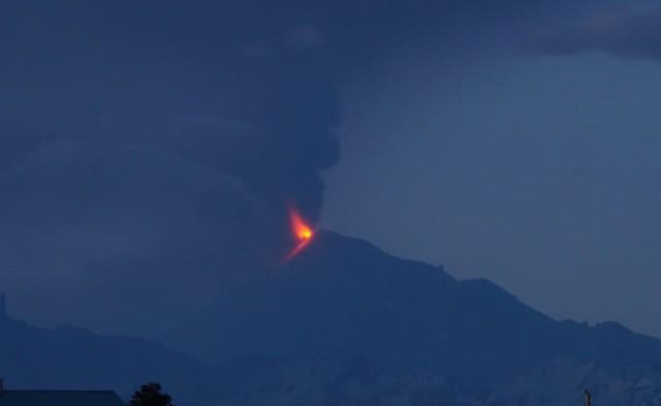 Pavlof in eruption, with lava fountaining and ash plume, in the early hours of June 4, 2014 as seen from Cold Bay. (Photo courtesy AVO/Robert Stacy)