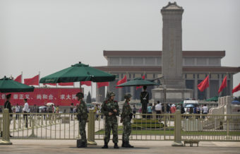 Chinese paramilitary police stand guard in Tiananmen Square in Beijing on June 4, the 25th anniversary of a violent crackdown on protesters by Chinese troops. Kevin Frayer/Getty Images