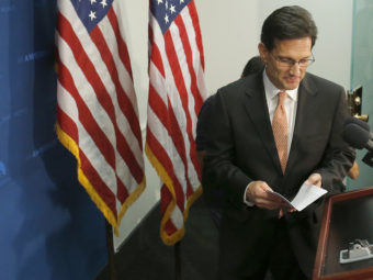 House Majority Leader Eric Cantor of Virginia takes the podium to speak to reporters on Capitol Hill in Washington, on Wednesday. He announced that he would step down as majority leader on July 31. Charles Dharapak/AP