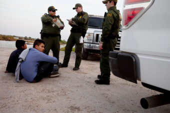 Young migrants seen apprehended by the Border Patrol near the Rio Grande in Hidalgo, TX, earlier this year. The next stop for many is either a detention center or deportation. Kainaz Amaria/NPR