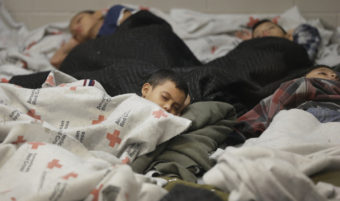 Children detainees sleep in a holding cell at a U.S. Customs and Border Protection processing facility in Brownsville,Texas. Eric Gay/AP
