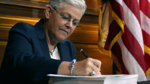EPA Administrator Gina McCarthy signs new regulations targeting greenhouse gas emissions on Monday. Chip Somodevilla/Getty Images