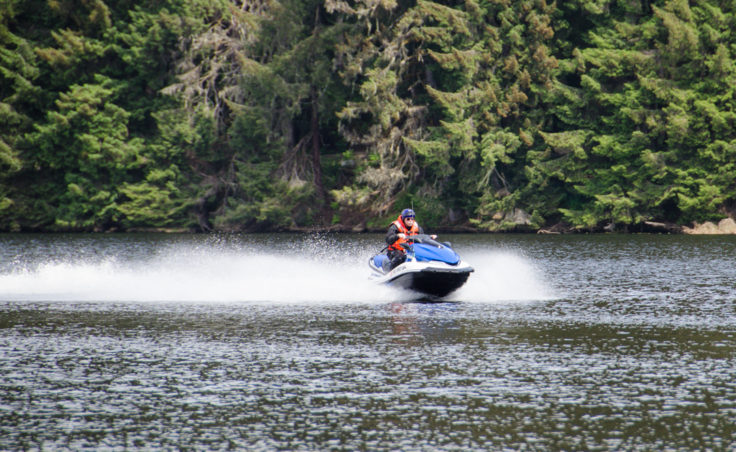 Coast Guard Recreational Boating Safety Specialist Mike Folkerts practices at Auke Lake. (Photo by Heather Bryant/KTOO)