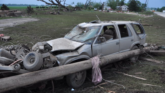 Damage is seen along Highway 15 in Pilger, Neb., Tuesday. A pair of tornadoes hit the area Monday evening. Ryan Robertson /NET News
