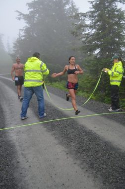 Women’s champion Tasha Folsom crosses the finish line on Harbor Mt. (Photo courtesy Sitka Alpine Adventure)