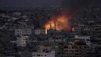 Smoke and flames from an Israeli strike rise over Gaza City on Thursday. Adel Hana/AP
