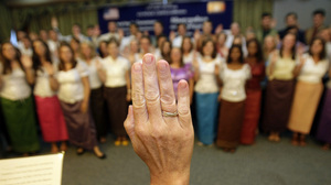 In this 2011 photo, more than 100 Peace Corps volunteers are sworn in before heading to villages in southern Cambodia. Heng Sinith/AP