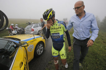 Spain's Alberto Contador abandons the Tour de France after crashing during the 10th stage Monday. Christophe Ena/AP