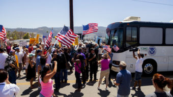 Protesters block the arrival of immigrant detainees who were scheduled to be processed at the Murrieta Border Patrol station in California on Tuesday. Sam Hodgson/Reuters/Landov