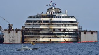 The process of refloating the Costa Concordia cruise ship started off Italy's Giglio Island Tuesday. Guiseppe Cacace/AFP/Getty Images