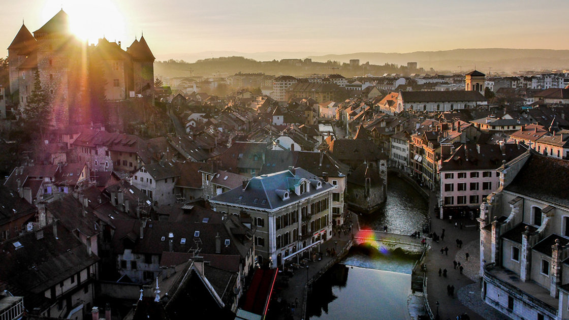The sun sets behind the buildings of the old city of Annency, France. drone-cs/Dronestagram