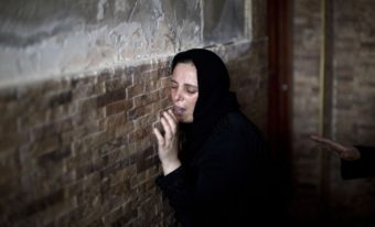 The Palestinian sister of Mohammed al-Daeri, 25, mourns during his funeral in Gaza City on Thursday. Mahmud Hams /AFP/Getty Images