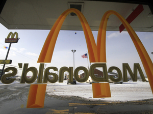 The National Labor Relations Board says McDonald's shares responsibility for how workers are treated at its franchised restaurants. Gene J. Puskar/AP