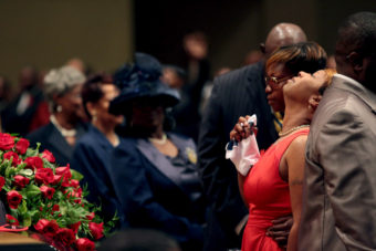 Lesley McSpadden is comforted during the funeral services for her son Michael Brown inside Friendly Temple Missionary Baptist Church in St. Louis, Mo., on Monday. Pool/Getty Images