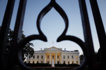 The White House, as seen through the fence on Pennsylvania Avenue. Mandel Ngan /AFP/Getty Images