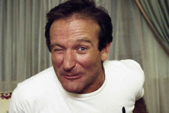 Comedian Robin Williams makes a face as he rises out of his chair during a November 1993 interview in New York.Wyatt Counts/AP