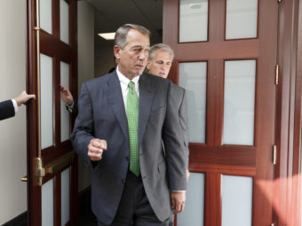 House Speaker John Boehner, R-Ohio, on Capitol Hill on Thursday. Boehner says Congress stands ready to work with the president on the threat from Islamic State militants. J. Scott Applewhite/AP