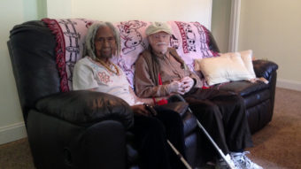 Edith Hill, 96, and Eddie Harrison, 95, shown here in their home in Annandale, Va., were married earlier this year. One of Hill's daughters says the marriage was improper and that Hill's estate is now in question. (Photo by Matthew Barakat/AP)