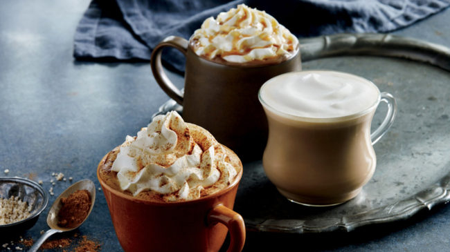 In some parts of the U.S., Starbucks is testing a latte flavored with roasted-stout notes along with its seasonal autumn drinks such as the Pumpkin Spice Latte, seen here at front. Starbucks