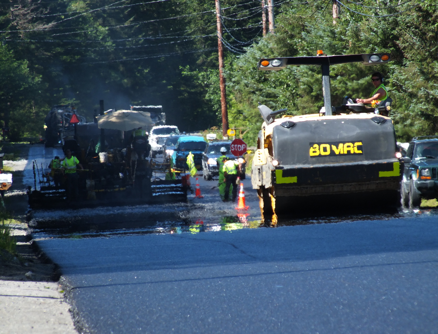 The hot asphalt mix releases heat, which distorts light and visuals. (Photo by Matt Miller/KTOO)