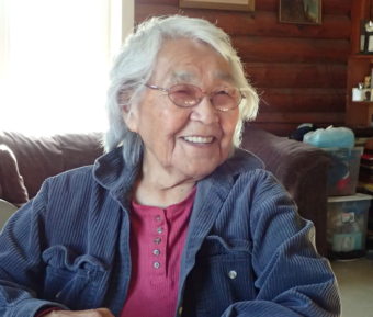 At her kitchen table in Minto, Alaska, 89-year-old Sarah Silas remembers a 1947 earthquake. (Photos by Ned Rozell/UAF Geophysical Institute)