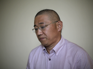 Kenneth Bae, an American tour guide and missionary serving a 15-year sentence in North Korea, speaks to The Associated Press on Monday. Bae and two other detained Americans urged the U.S. to send a high-level emissary to secure their release. Wong Maye-E/AP
