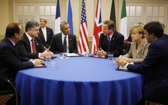 President Obama sits with (from left) France's President Francois Hollande; Ukraine President Petro Poroshenko; British Prime Minister David Cameron; German Chancellor Angela Merkel; and Italian Prime Minister Matteo Renzi as they meet about Ukraine at the NATO summit at Celtic Manor in Newport, Wales, on Thursday. Charles Dharapak/AP