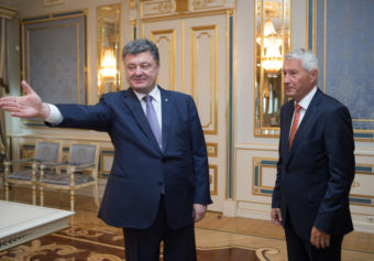 Ukrainian President Petro Poroshenko, left, welcomes Secretary-General of the Council of Europe Thorbjorn Jagland during a meeting in Kiev on Monday. Mykhailo Markiv/AP