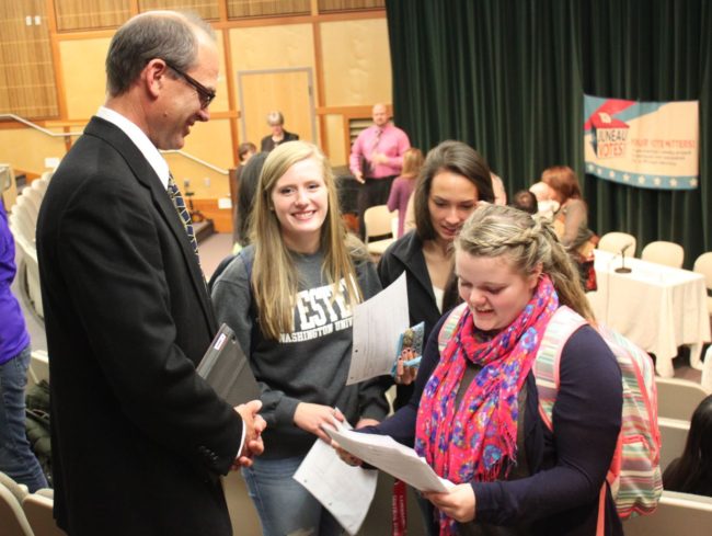 Areawide Assembly candidate Tony Yorba talks with students after the Juneau Votes Forum. (Photo by Lisa Phu/KTOO)