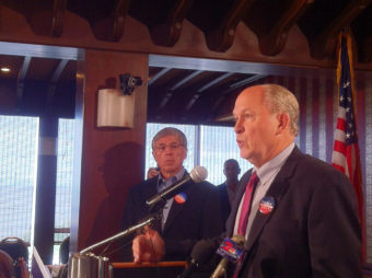 Bill Walker (right) addresses a press conference about his decision to join Byron Mallott (left) on a Unity Ticket. (Photo by Anne Hillman/KSKA)