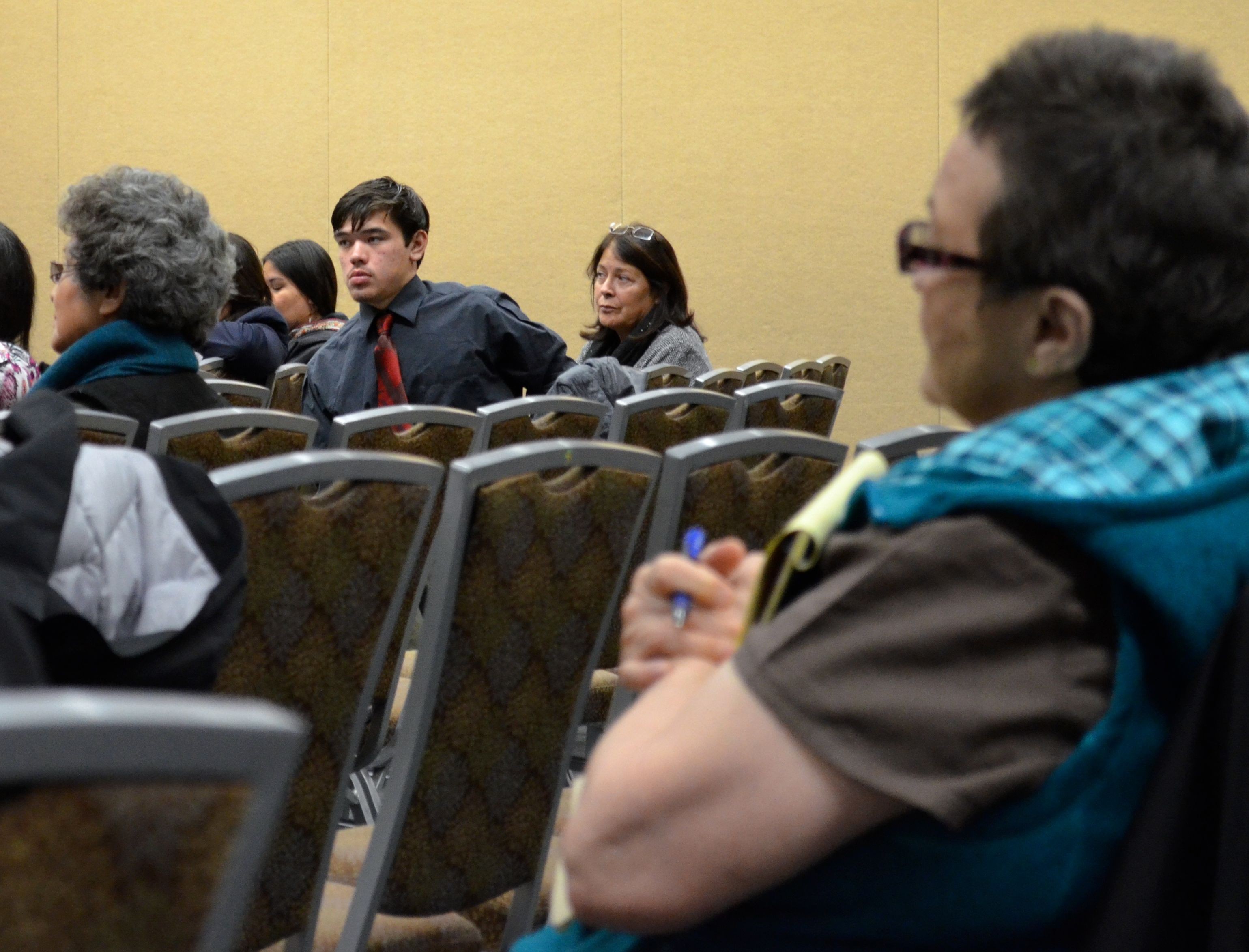 Alaska Federation of Natives President Julie Kitka listens during a panel discussion on taking tribal land into trust. (Photo by Jennifer Canfield/KTOO)