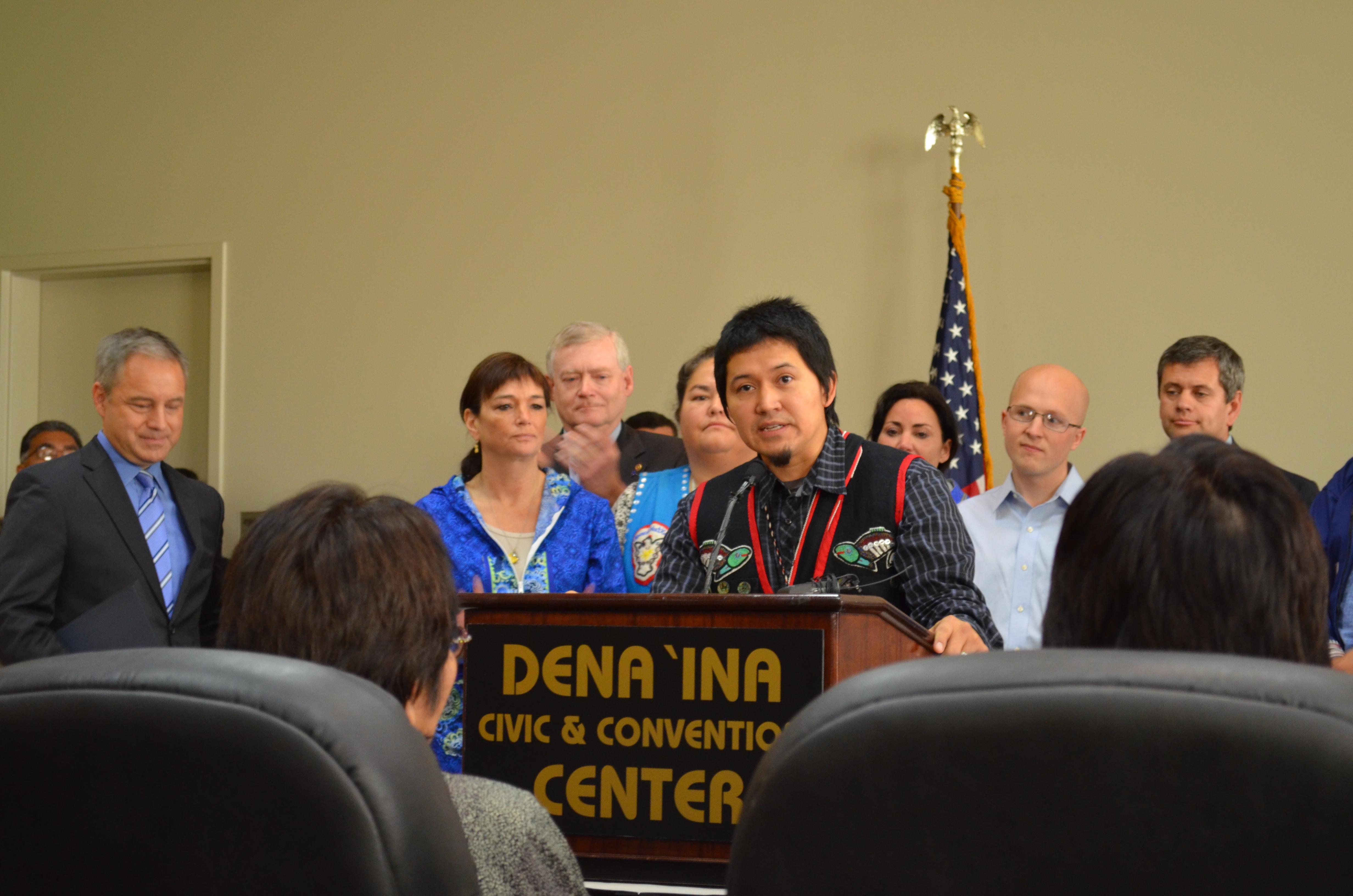 Xh'unei Lance Twitchell addresses the crowd that had gathered for the signing of HB 216, a bill making Alaska's Native languages official state languages. (Photo by Jennifer Canfield/KTOO)