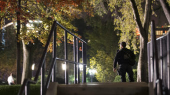 Secret Service respond on the North Lawn of the White House after a man jumped the White House fence Wednesday night. This latest incident comes about a month after a previous fence-jumper sprinted across the lawn, past armed uniformed agents, and entered the Executive Mansion. (Jacquelyn Martin/AP)
