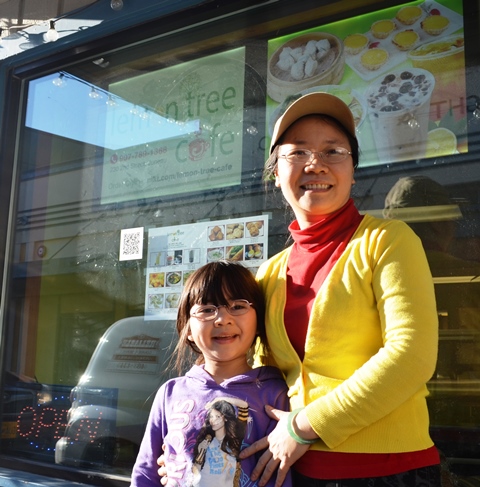 Mae Wu, pictured with her daughter Audrey, is the owner of Lemon Tree Cafe. (Photo by Jennifer Canfield/KTOO)