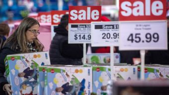 Retailers' Black Friday ads and other parts of the holiday season are designed to tap into a very ancient part of our brains. (Photo by Paul J. Richards/AFP/Getty Images)