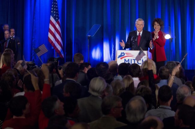 Sen. Mitch McConnell is accompanied by his wife Elaine Chao at his victory event in Louisville, Kentucky, on Tuesday. Aaron P. Bernstein/Getty Images 