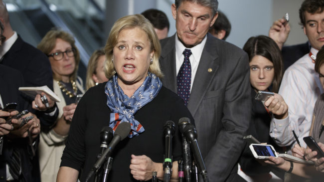 Sen. Mary Landrieu, D-La., chair of the Senate energy committee, spoke Wednesday about getting congressional approval for the Canada-to-Texas Keystone XL pipeline. With her is Sen. Joe Manchin, D-W.Va., a member of the committee. J. Scott Applewhite/AP