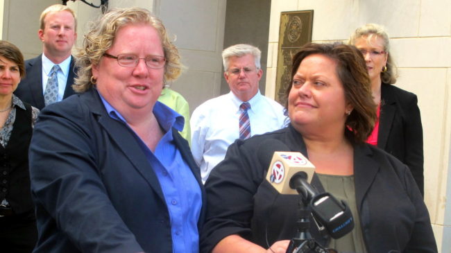  Colleen Condon, left, and her partner Nichols Bleckley appear at a news conference in Charleston, S.C., in October, shortly after filing a federal lawsuit seeking the right to marry in South Carolina. A federal judge has ruled in their favor. Bruce Smith/AP