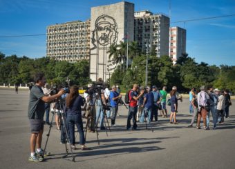 Journalists wait for Cuban performance artist Tania Bruguera at Revolution square in Havana, on Wednesday. Adalberto Roque /AFP/Getty Images