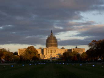 The sun sets on the U.S. Capitol Building on the National Mall in Washington. On January 6th, Republicans will take over both chambers for the 114th Congress. Carolyn Kaster/AP
