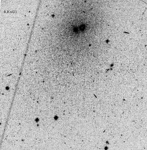 A negative image of Kks3, made using the Advanced Camera for Surveys on the Hubble Space Telescope. The core of the galaxy is the right hand dark object at the top center of the image. D. Makarov/Royal Astronomical Society