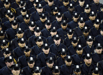 Cadets stand during the New York Police Department graduation ceremony at Madison Square Garden on Monday. Kevin Mazur/Getty Images