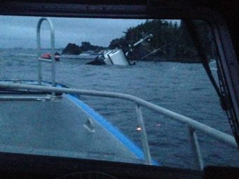Sitka search and rescue volunteer Jake Denherder took this photo of the sinking F/V Eyak from the Alaska State Trooper vessel Courage, early on January 19, 2015. (Photo courtesy of Jake Denherder.)