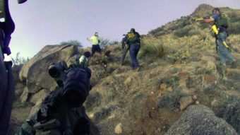 An image taken from a camera worn by an Albuquerque Police Department officer shows a standoff with James Boyd in the Albuquerque foothills, in March of 2014. Two officers will face murder charges over Boyd's death. AP