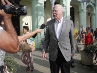U.S. delegation leader Sen. Patrick Leahy (D-Vt.) talks with reporters as he leaves the Hotel Saratoga, in Havana, Cuba, on Saturday. Desmond Boylan/AP