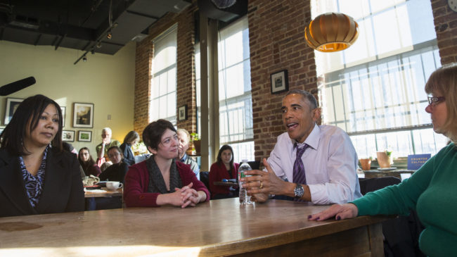 President Obama discussed the need for paid sick leave with women at Charmington's Cafe in Baltimore Thursday. With him are Vika Jordan (from left), Amanda Rothschild and Mary Stein. Evan Vucci/AP