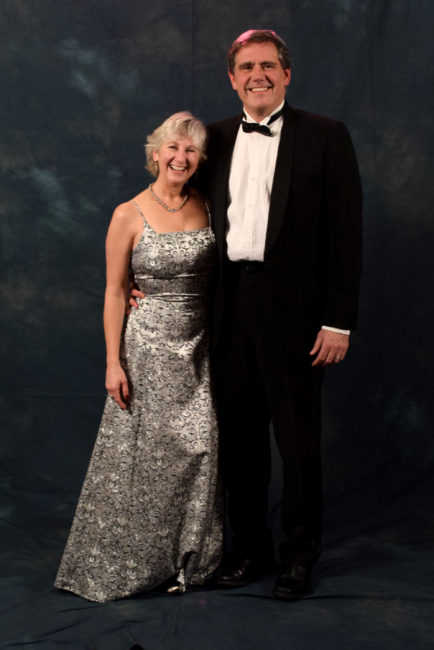 DJ and David Thomson. DJ bought her floor length dress at Alaskan Dames Consignment Shop. The last time David wore his tux, handed down from his father, was at the Alaska Statehood Ball.  (Photo by Skip Gray/KTOO)