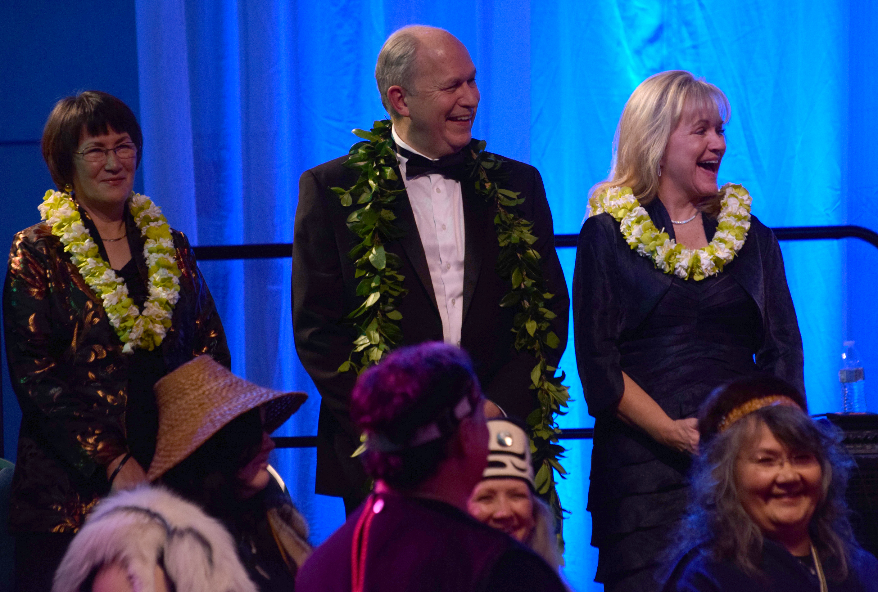 Toni Mallott, Gov. Bill Walker and First Lady Donna Walker on stage during the Inaugural Gala. (Photo by Skip Gray/KTOO)