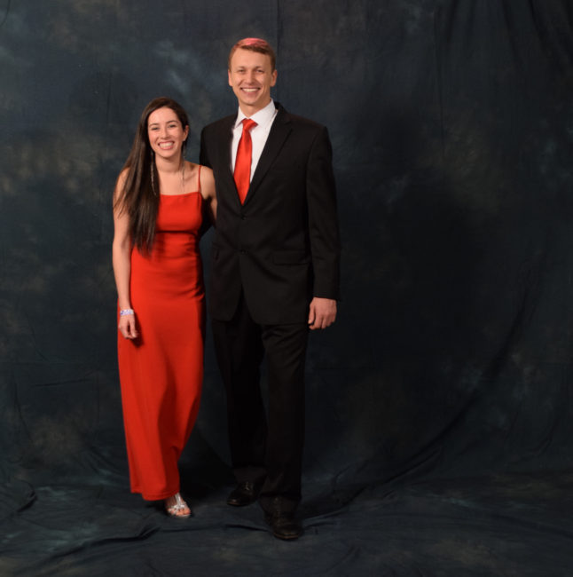 Danielle Zimmerman and Dimitri Stepenoff. Zimmerman's red dress once belonged to her mother. Stepenoff's shoes are by Johnston & Murphy.  (Photo by Skip Gray/KTOO)