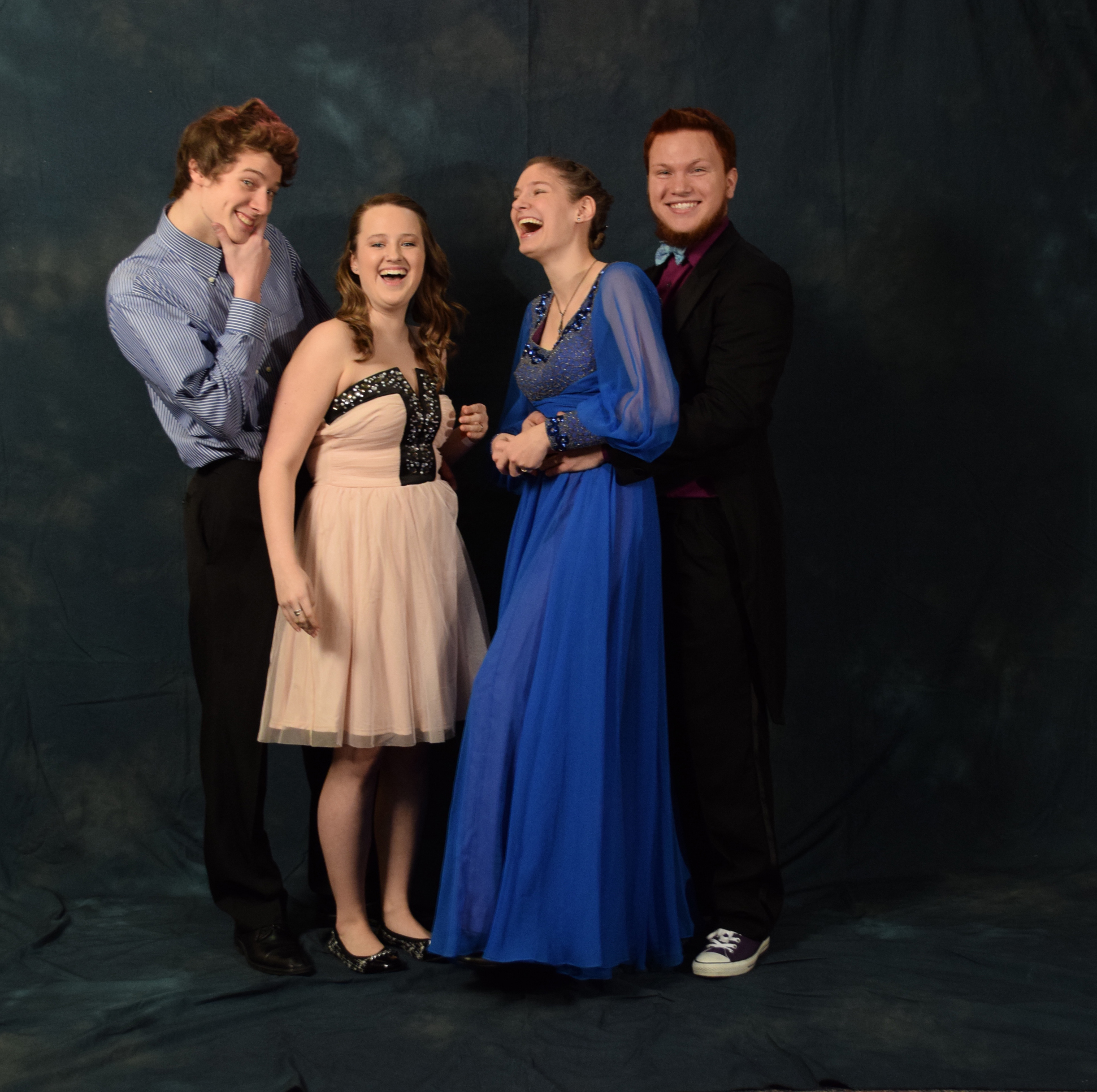 Riley Cummins, Mikala McKim, Emily Zahasky and Quinn Zahasky.  Emily got her blue dress from an antique store in Iowa for $30, "It fit me like a glove." Quinn's purple Converse matched his purple shirt.  (Photo by Skip Gray/KTOO)